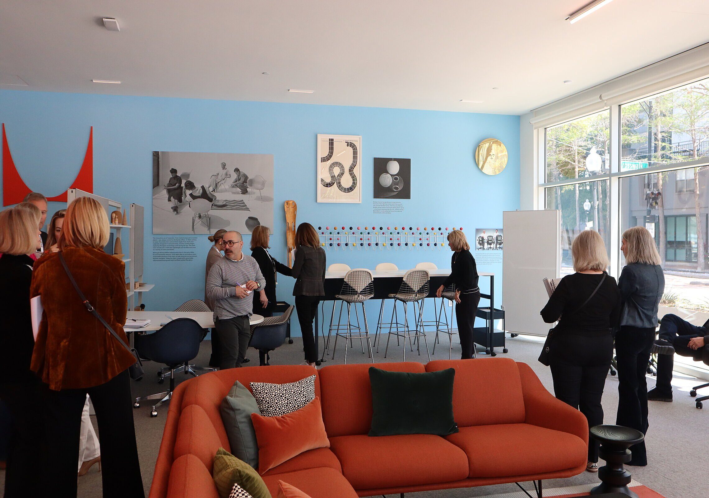 Group of people looking at MillerKnoll Furniture