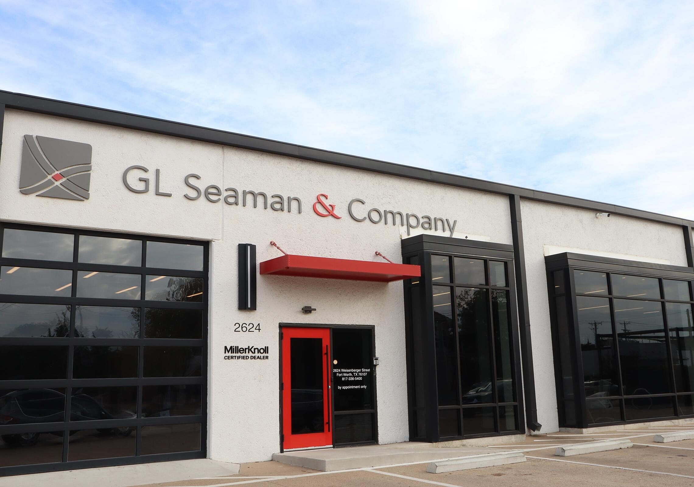 outside of GL Seaman & Company Fort Worth Building with a red door