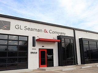 outside of GL Seaman & Company Fort Worth Building with a red door
