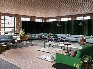 MillerKnoll couches, chairs, coffee tables, and lighting set up in a room to display products