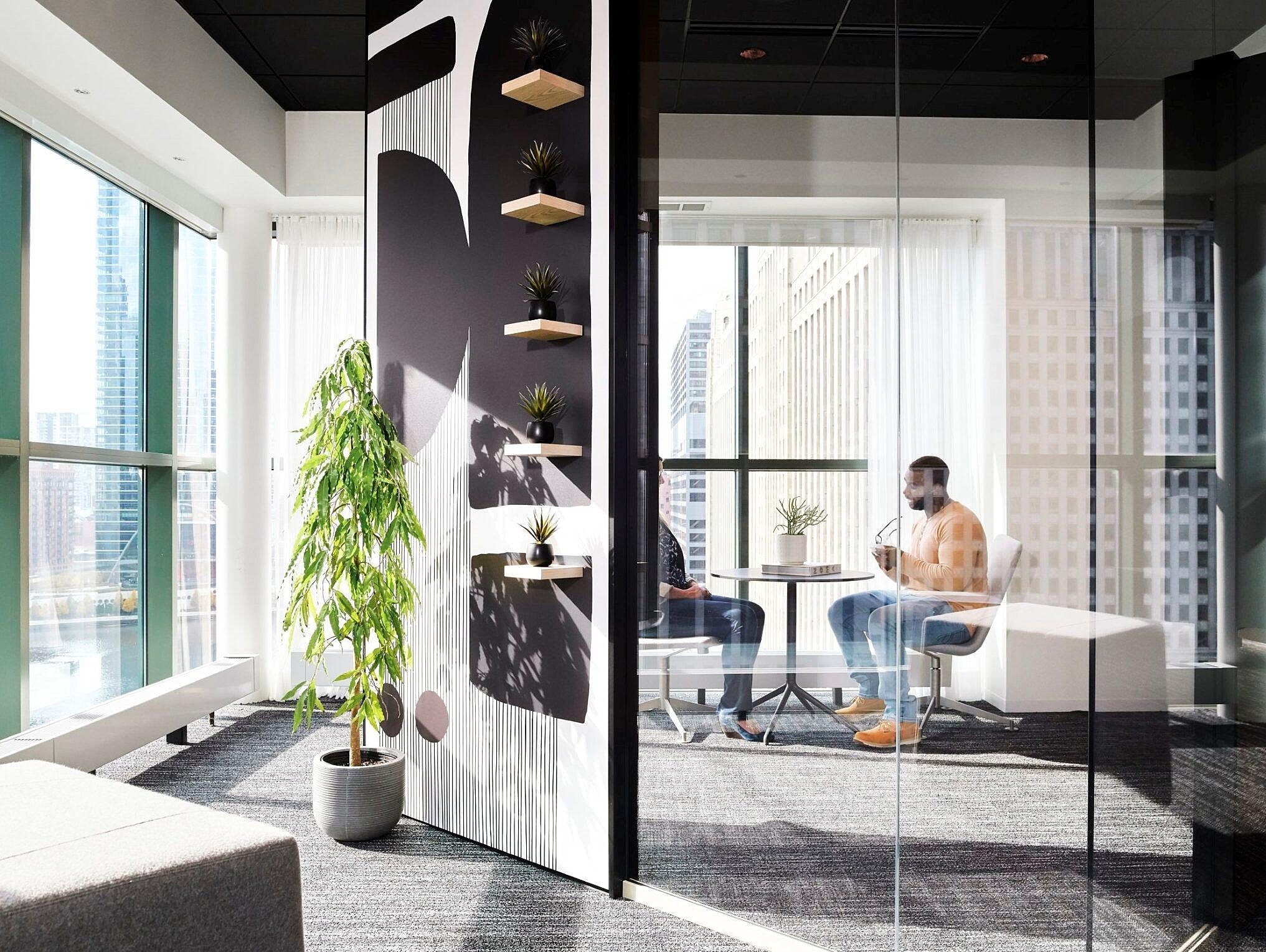 DIRTT Glass Walls around a private office