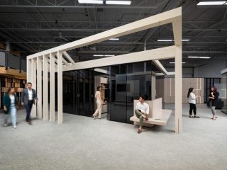 DIRTT Timber Structure around a private office enclosed in glass in a corporate office