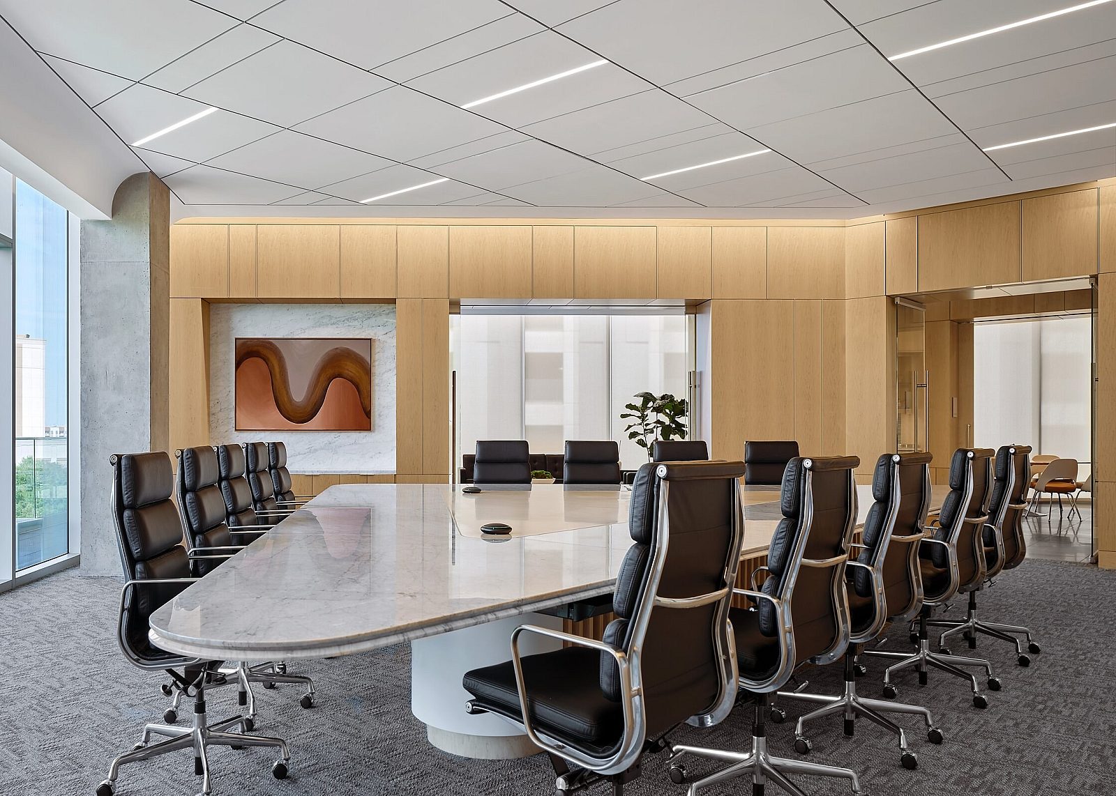 State Bank of Texas Conference Room with large marble table and black leather chairs