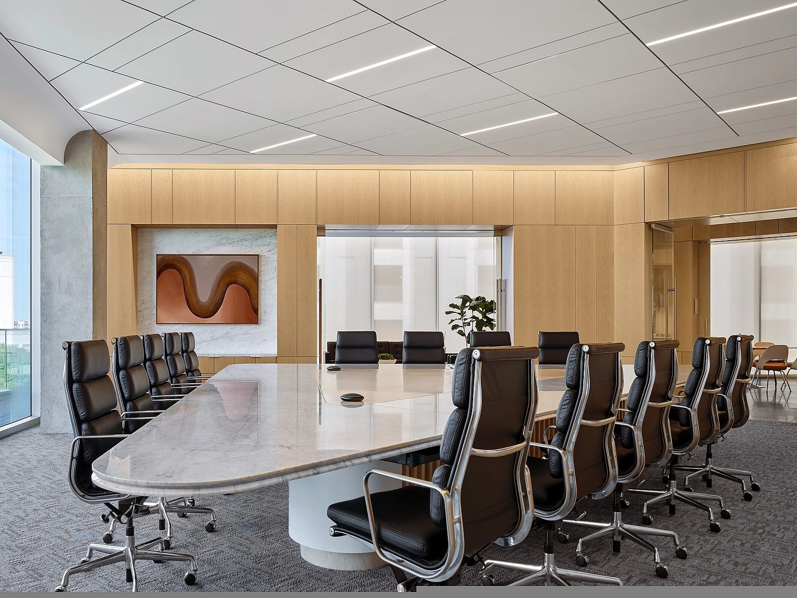 State Bank of Texas Conference Room with large marble table and black leather chairs