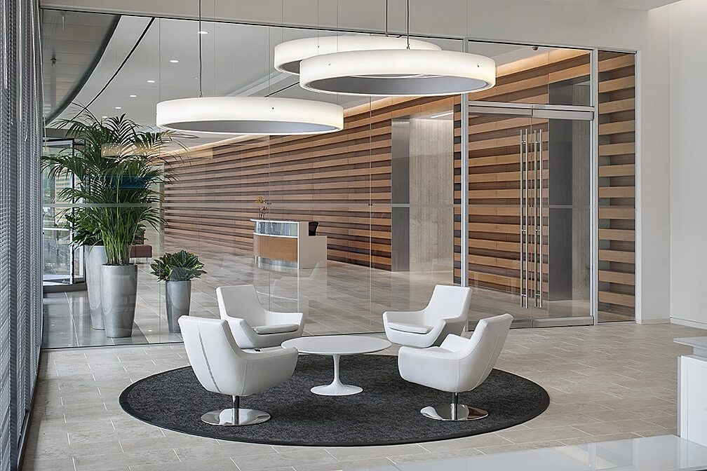 Corporate office seating area with a coffee table and chairs