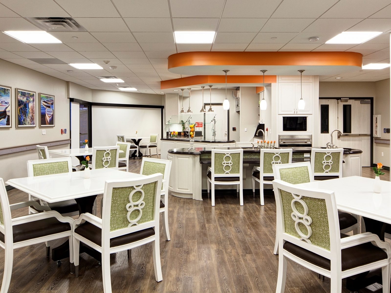 Healthcare facility dining hall with tables and chairs